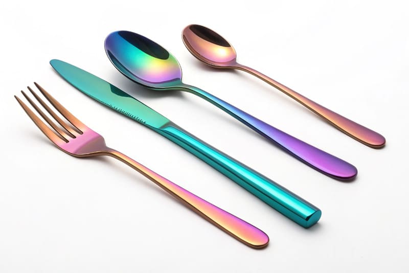 A family using titanium cutlery at a picnic table